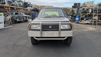 1990 Suzuki Vitara ET - Left Headlight