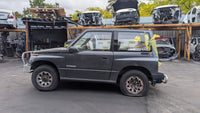 1990 Suzuki Vitara ET - Left Headlight