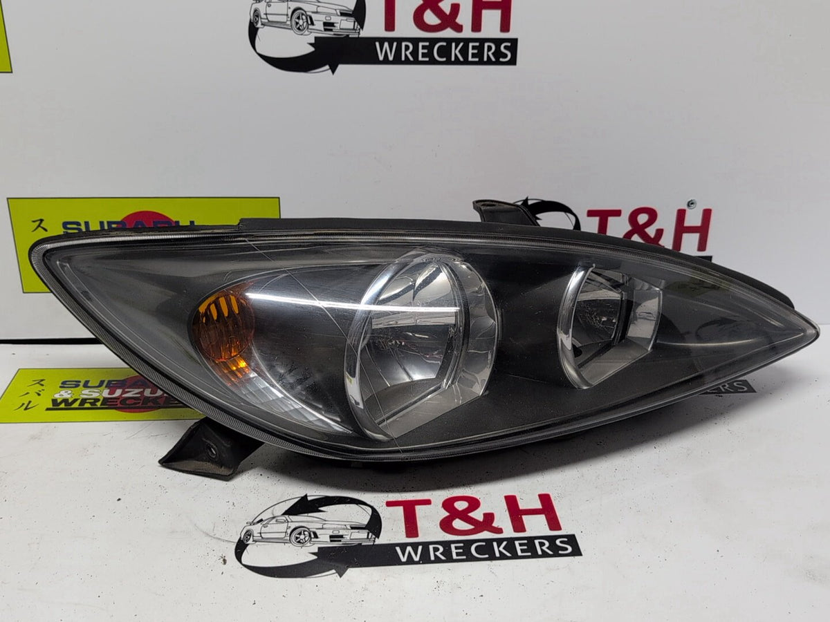 2002-2004 Toyota Camry Sportivo Right Headlight SK36 Black Insert Type